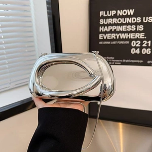 Silver metallic mirror evening clutch bag with ring handle and slim chain strap