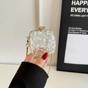 Chic mirror-finish evening clutch bag with golden chain strap for women's crossbody wear