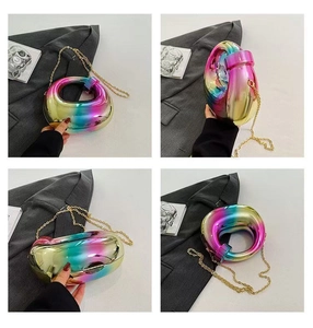 Detailed views of high-end acrylic rainbow gradient handbag with metallic chain