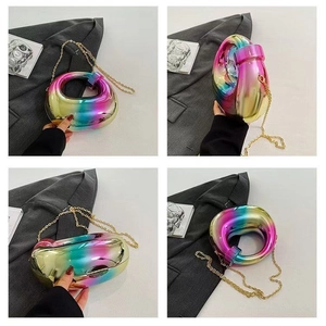 Rainbow gradient acrylic evening bag with metallic finish and gold chain strap