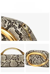 Detail show of snake skin texture bucket bag with elegant golden oval metal handle