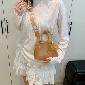 Translucent caramel PVC jelly handbag with printed wide strap and matching round coin pouch
