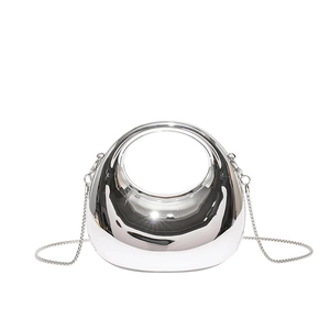 Silver mirror metal egg-shaped handbag with hollow handle and chain for women