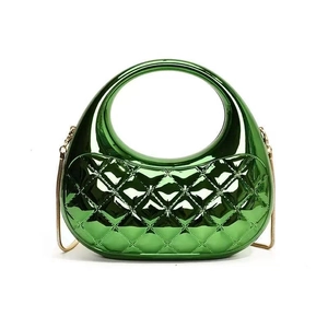 Fashionable green metallic mini crossbody bag with quilted pattern and gold chain strap