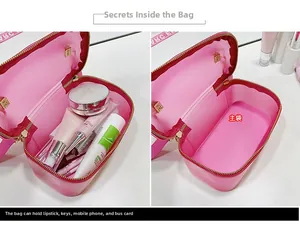 Macro view of spacious main compartment in pink patent leather makeup bag with items