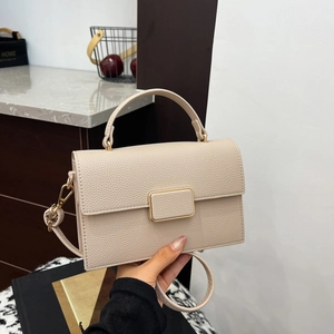Minimalist cream white crossbody square bag with gold metal buckle and leather texture