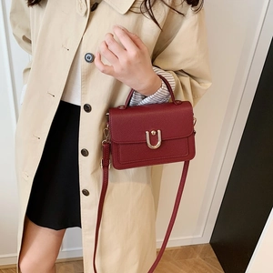 Elegant wine red square handbag with gold U-shaped lock and leather strap for women