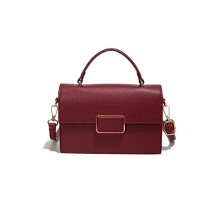Minimalist burgundy litchi leather square bag with gold hardware and top handle