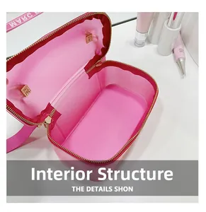 Detail shot of spacious interior and golden zipper of this magenta crossbody bag