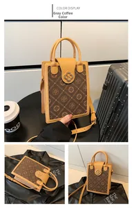 Detail showing vintage brown logo canvas with leather trim and metallic floral twist lock