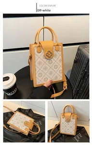 Close-up of beige crossbody bag featuring vintage clover lock and letter print texture
