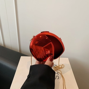 Elegant red mirror oval clutch bag with gold chain strap for evening parties