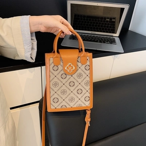 Retro monogram canvas small square crossbody bag with brown leather trim and gold buckle