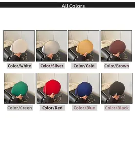 Oval acrylic clutch bags shown in eight colors including gold silver and black with chain