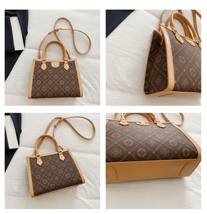 Vue détaillée du sac à main patchwork marron avec motif rétro, boucle dorée et poignée