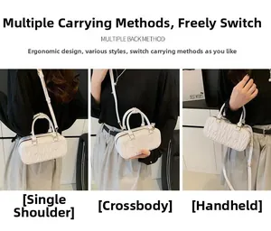 Sac cylindrique blanc matelassé en trois styles: à main, à l'épaule et en bandoulière