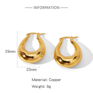 Detailed technical view of teardrop copper earrings with size 29mm and weight 9g
