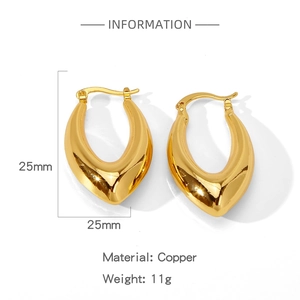 Detailed view of irregular golden water drop earrings with 25mm dimensions and copper material