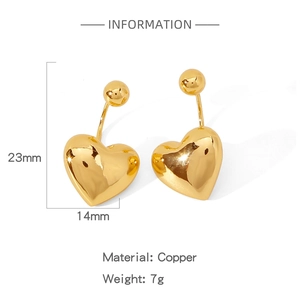 Detail view of gold heart earrings showing dimensions 23mm height and 14mm width