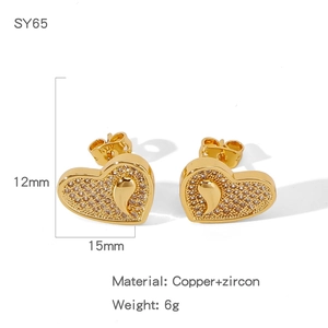 Detail showing 15mm copper gold heart studs with zircon micro-pave setting
