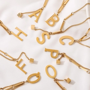 Classic gold stainless steel alphabet pendant necklace with unique link chain design