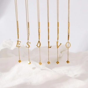 Classic gold stainless steel initial necklaces with hollow letters and cube pendants