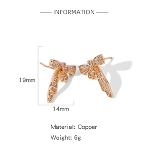 Détails des boucles d'oreilles papillon en cuivre rose doré avec zircons cubiques