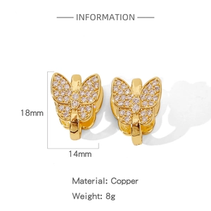 Detailed view of gold butterfly earrings with cubic zirconia and 18mm x 14mm dimensions