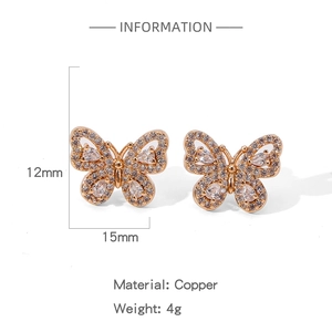 Vue détaillée des boucles d'oreilles papillon or rose avec dimensions et matériaux