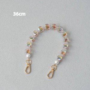 Detailed view of a 36cm colorful heart acrylic bead chain with golden lobster clasps
