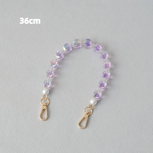 Detail of 36cm acrylic beaded chain with purple iridescent beads and gold lobster clasps