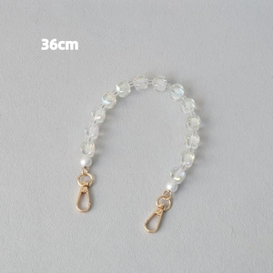 Detail of 36cm acrylic beaded chain with iridescent finish and gold lobster clasps