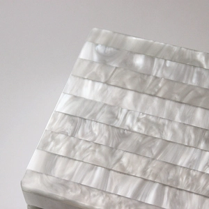 Chic pearlescent acrylic evening clutch bag with gray and white striped pattern