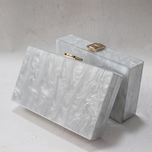 Elegant white marble acrylic clutch bag with gold metal clasp for wedding and evening parties