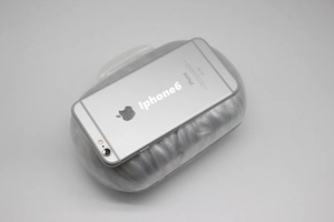 Macro view of a round acrylic evening clutch bag showing its translucent material detail