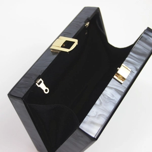Elegant black and white marble acrylic evening clutch bag with gold metal hardware