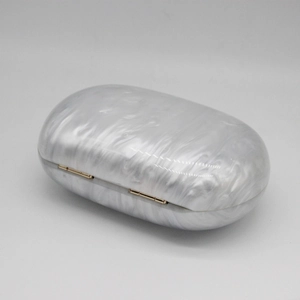 Elegant white acrylic round clutch bag with marble texture and gold hardware details