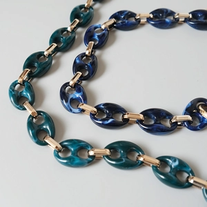 Acrylic resin chain with leopard print pig nose links and gold metal connectors