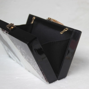 Elegant black marble pattern acrylic evening clutch bag with gold clasp and chain strap