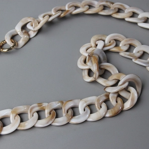 Chunky acrylic resin chain bag strap with marble texture and gold metal rings