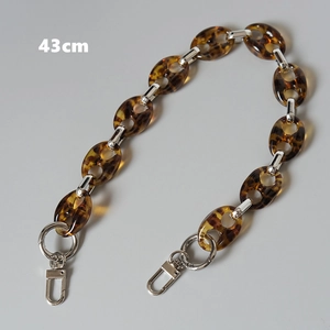 Detail of 43cm leopard print acrylic resin chain with silver metal clasps for bags