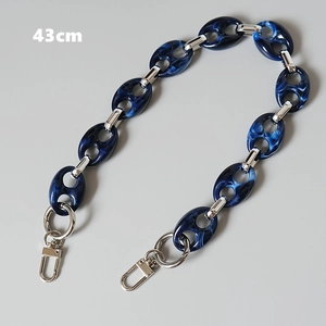 Detail of 43cm marble resin pig nose bag chain with silver metal swivel lobster clasps