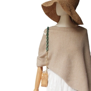 Vintage wooden handbag with green acrylic chain strap displayed on mannequin