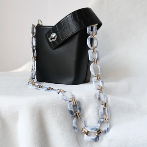Vintage black bucket bag with marble acrylic resin chain and crocodile embossed strap