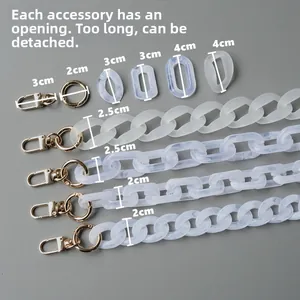 Macro detail of DIY acrylic bag chain links with marble texture and metal clasps