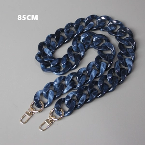 Detail view of 85cm dark blue marbled acrylic handbag chain strap with gold metal clasps