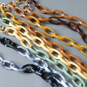 Colorful chunky acrylic resin bag straps with gold metal spring buckles in varied retro colors