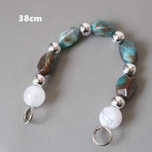 Detail of 38cm vintage acrylic resin bead chain handle with silver metal ring clasps