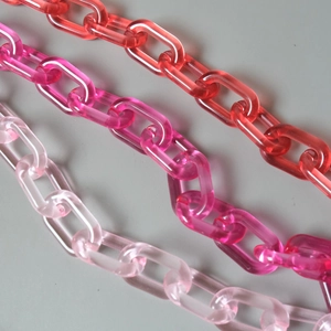 Candy colored resin acrylic bag chains in red and pink shades for shoulder bags