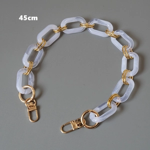 Detail of 45cm white marble acrylic chunky chain with gold metal hooks for handbags